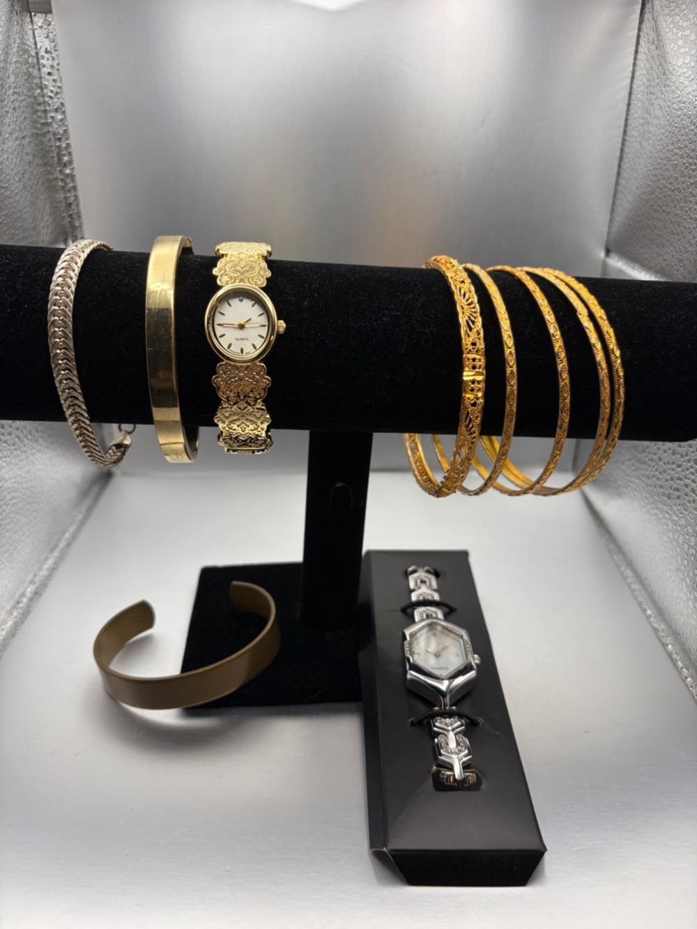 Lot of eight bracelets and two new quartz watches